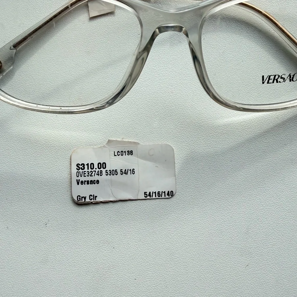 Versace Eyeglasses Gold and Clear Eyewear Chic Sophisticated Retail $310